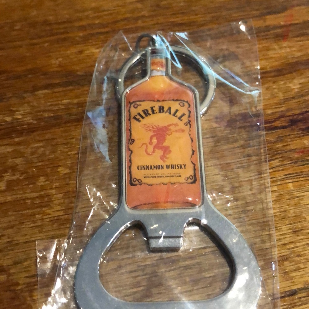 New Fireball key chain opener or curious Traveler